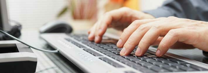 Man Typing on Keyboard Man Typing on Keyboard